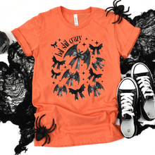 Load image into Gallery viewer, Wholesale Bat Shit Crazy Bow Graphic Tee - Heather Orange Tee
