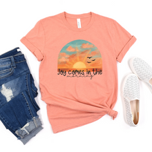 Load image into Gallery viewer, Wholesale Joy comes in the morning Graphic Tee - Heather Sunset Tee
