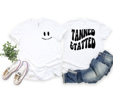 Load image into Gallery viewer, Wholesale Tanned &amp; Tatted Graphic Tee - Tan Tee
