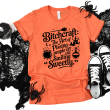 Load image into Gallery viewer, Wholesale Bitchcraft Halloween Graphic Tee - Heather Orange Tee
