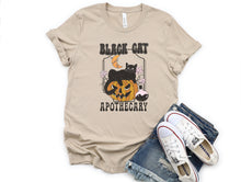 Load image into Gallery viewer, Wholesale Black Cat Apotehcary Graphic Tee - Tan
