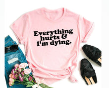 Load image into Gallery viewer, Wholesale Everything Hurts Graphic Tee - Pink
