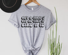 Load image into Gallery viewer, Wholesale Uses it Like a 10 Graphic Tee - White
